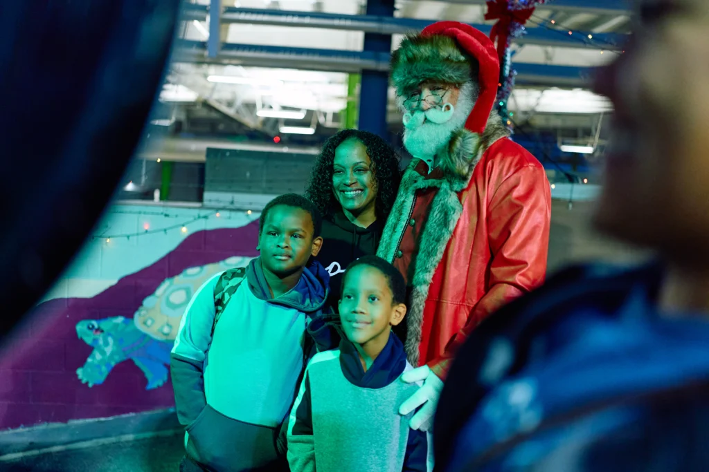 Guests posing with Santa